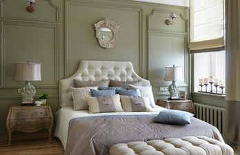 Спальня в зелёном цвете с кроватью