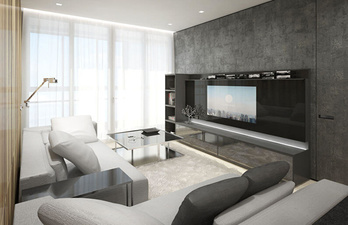 Светлая гостиная с диванами и телевизором